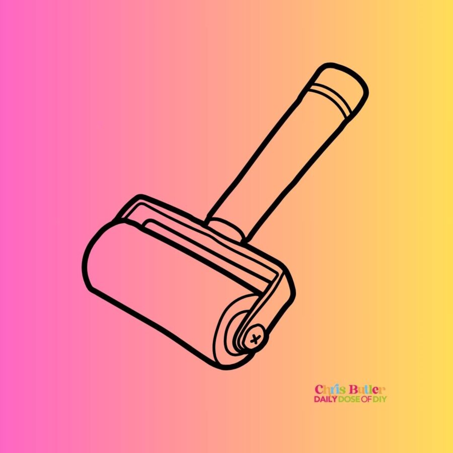 brayer tool icon for crafing on a pink and yellow background