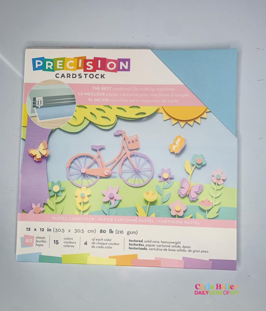 Picture of a pack of Precision Cardstock by American Crafts,  the Spring collection with pastel colors. 