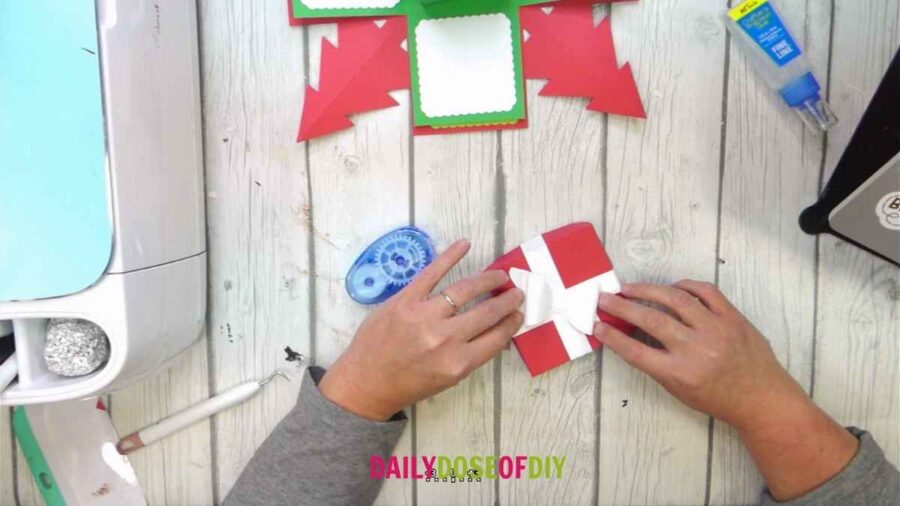 glue bow to top of box
