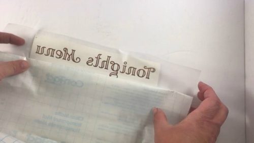 Use contact paper to transfer your menu to the dry erase board