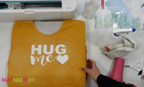 letting the bleach dry on a shirt to reveal the design.