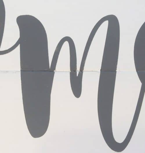 reavealing the crisp letters without bleeds form a stencil 