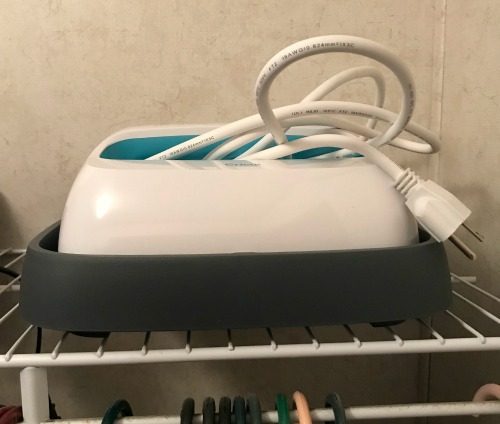 Cricut Easy Press stores easily on a shelf based on my Easy Press Review. 