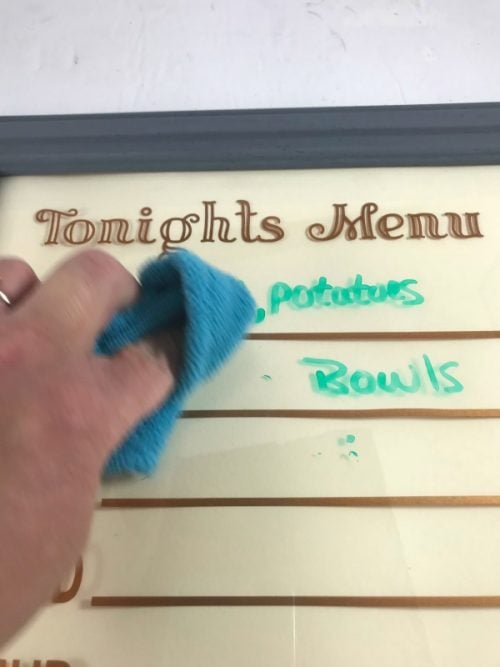 use dry cloth to erase the menu board