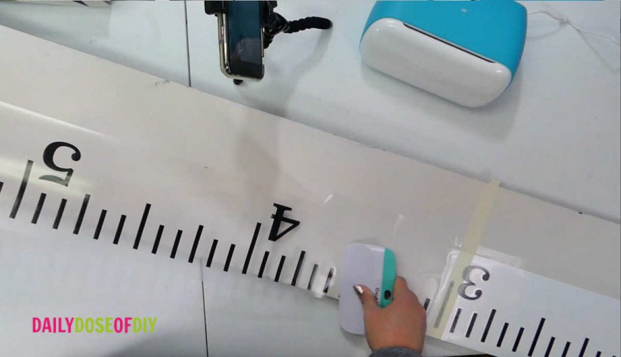 applying the growth chart svg with adhesive vinyl 