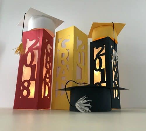 DIY Graduation Decor -Make paper lanterns and caps with this free cut file.