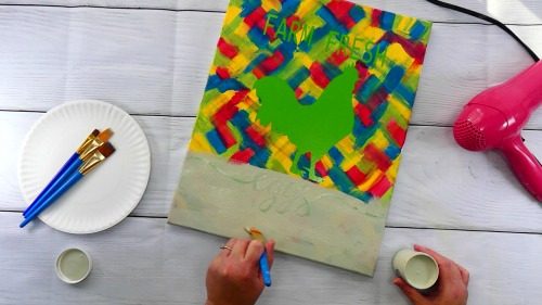 Painting the final neutral color of the hot mess canvas