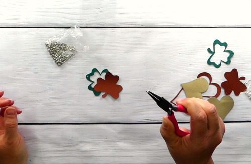 Use a jump ring to put together the faux leather earrings