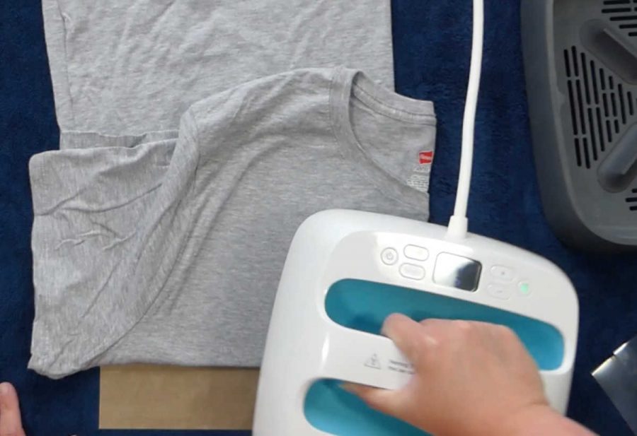 heat up your shirt before you apply vinyl 