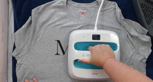 Use a Cricut Easy Press to press you mom design onto your t-shirt