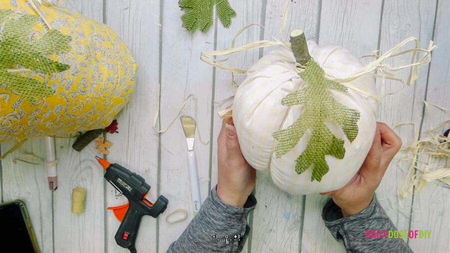 Finished simple DIY fabric pumpkin, white plaid with green burlap leaf 
