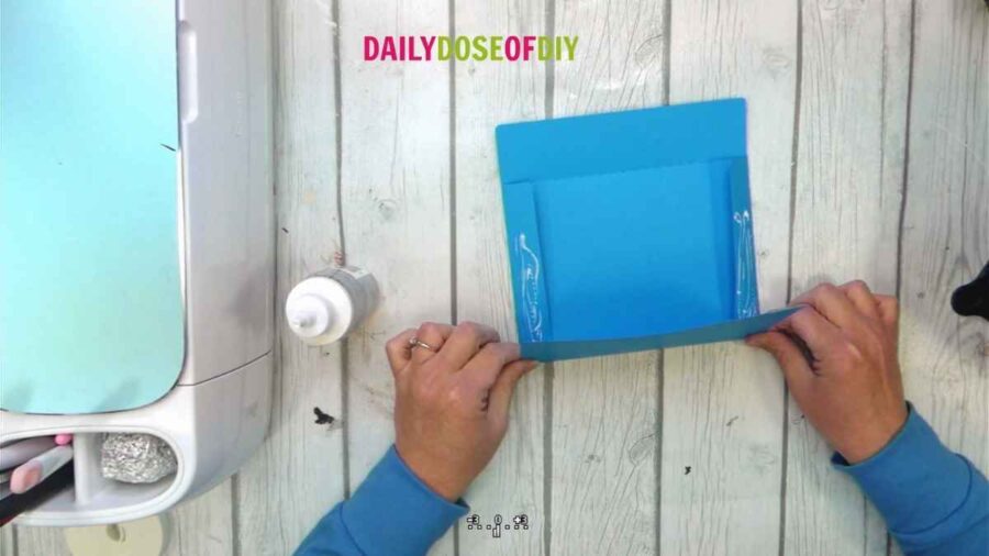 glue side tabs of envelope