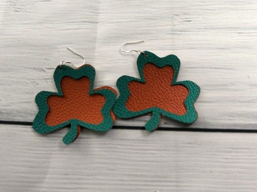 Faux leather shamrock earrings made with Cricut