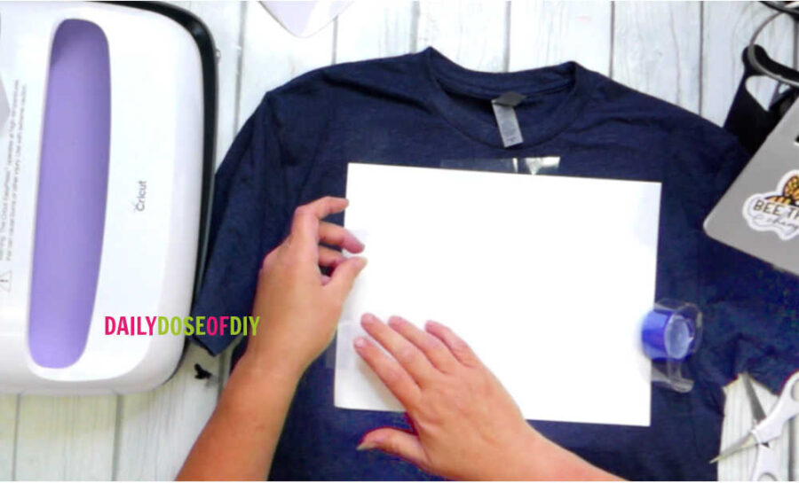 Center your sublimation design on your shirt and use heat resistant tape to secure it.