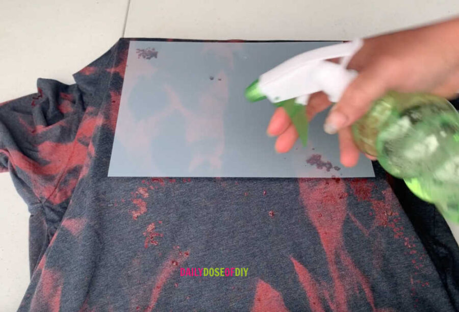 using a template to bleach the area for a sublimation design on a shirt