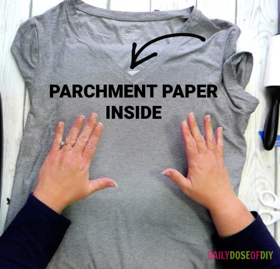 Place parchment paper inside of your t-shirt to prepare for sublimation