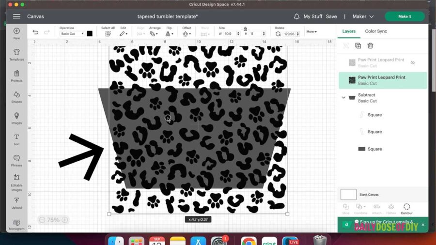 placing an image over the template in Cricut design space so that the image will cut in the shape of the template.  The image is cheetah print and paw prints. 
