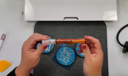 using the wood scorch marker to wood burn ornaments