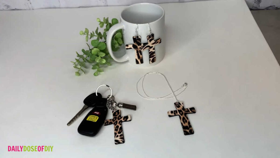 finished wooden cross accessories displayed on a white table